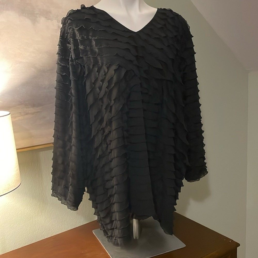 Black ruffled shirt